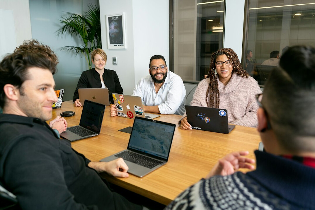 business professionals in meeting