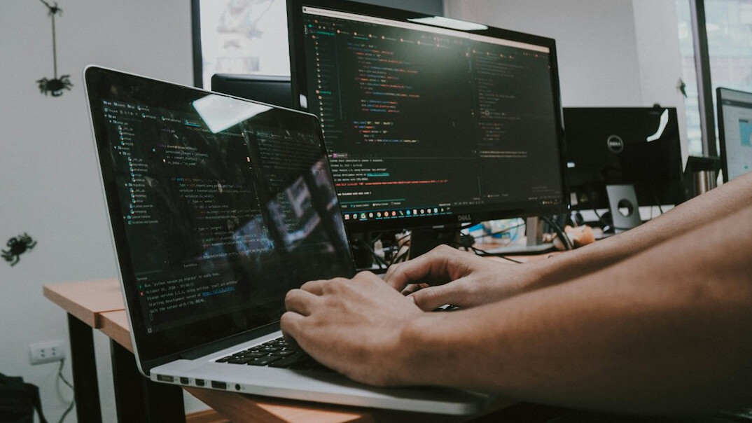 programmer reviewing code